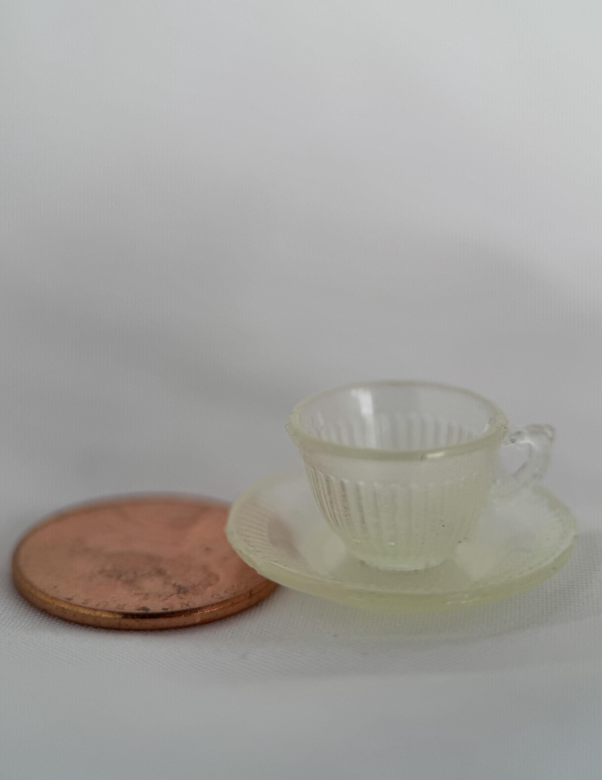 Faux Uranium Glass Miniature Teacup and Saucer